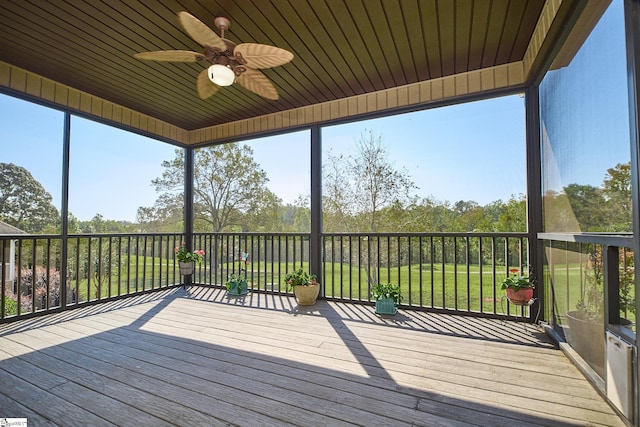 exterior space with a yard and ceiling fan