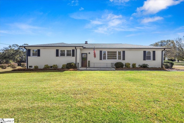 ranch-style house featuring a front yard