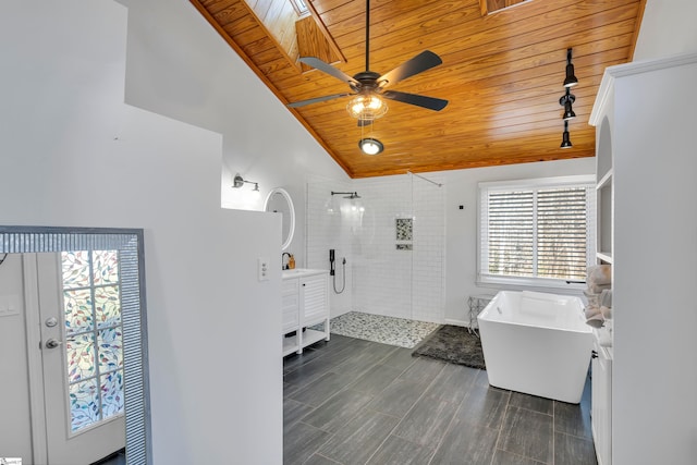 bathroom with vanity, a skylight, plus walk in shower, and wooden ceiling