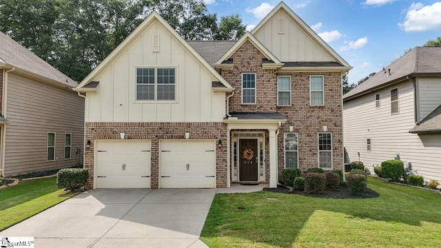 view of front of home featuring a front lawn and a garage