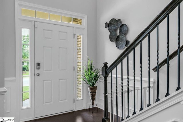 foyer featuring dark wood-type flooring