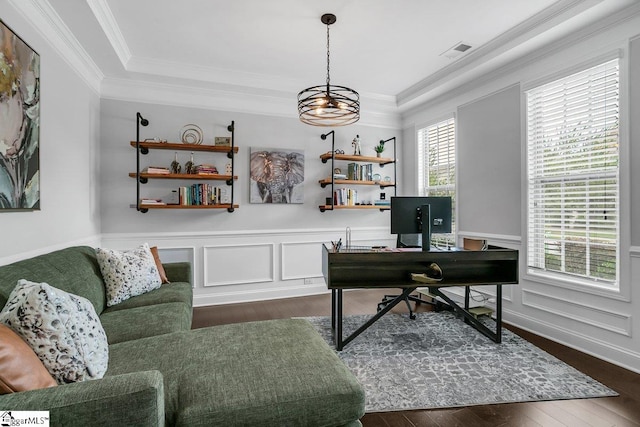 office space featuring a notable chandelier, a healthy amount of sunlight, crown molding, and dark hardwood / wood-style floors