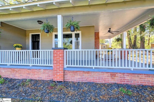 exterior space featuring ceiling fan and a porch