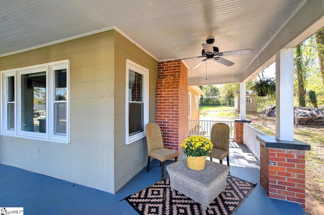 view of patio / terrace with a porch and ceiling fan