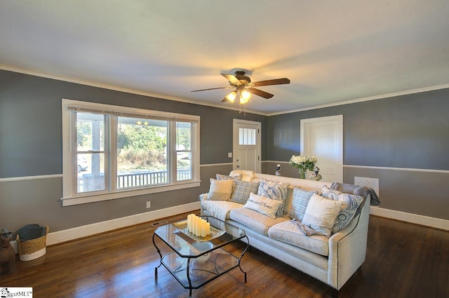 living room with ceiling fan, ornamental molding, and dark hardwood / wood-style floors