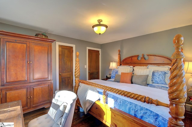 bedroom featuring dark hardwood / wood-style floors