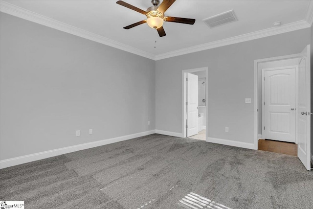 unfurnished room with crown molding, carpet floors, and ceiling fan