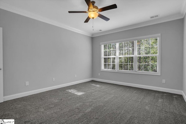 spare room featuring crown molding, carpet, and ceiling fan