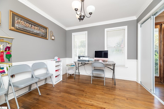 office area featuring ornamental molding, hardwood / wood-style floors, and a healthy amount of sunlight