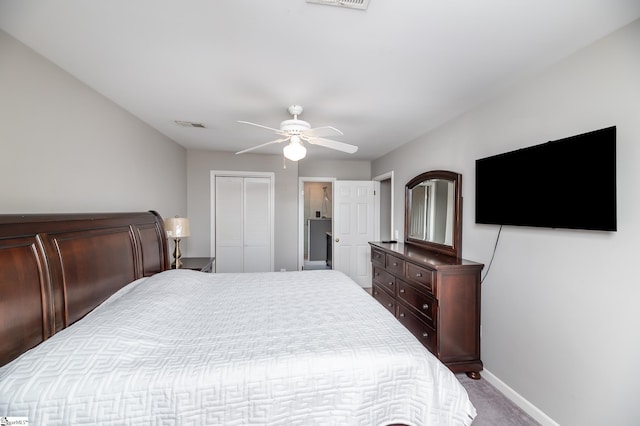 bedroom with carpet, a closet, and ceiling fan