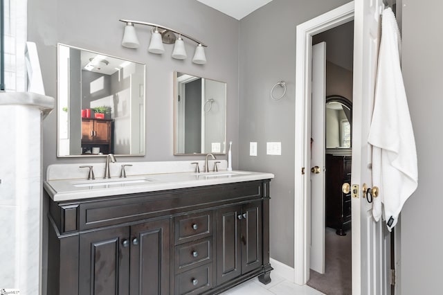 bathroom with vanity and tile patterned flooring