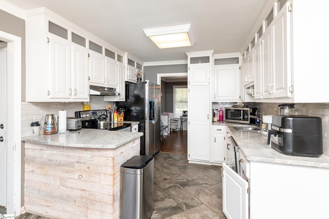 kitchen with white cabinetry and stainless steel appliances