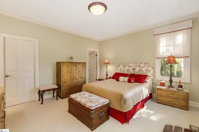 bedroom with ornamental molding and light carpet