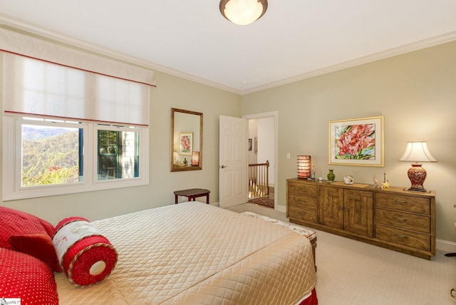 carpeted bedroom with crown molding