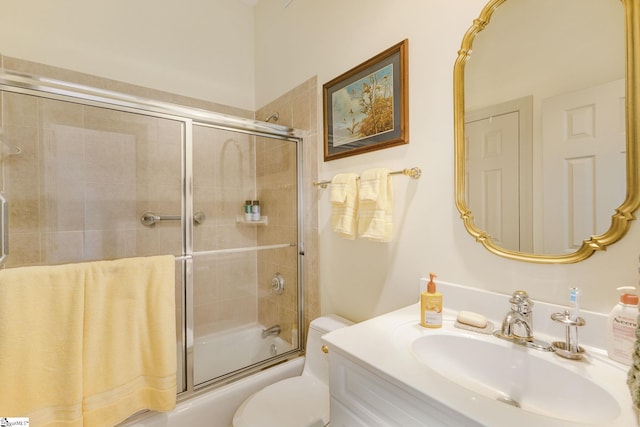 full bathroom featuring vanity, toilet, and enclosed tub / shower combo