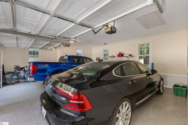 garage featuring a garage door opener