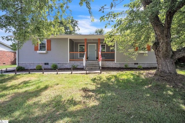 view of front of house featuring a front yard and a porch