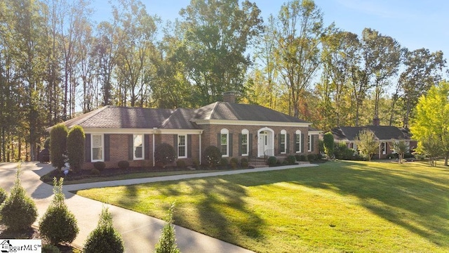 ranch-style house with a front yard