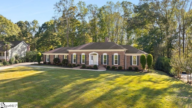 ranch-style house with a front yard