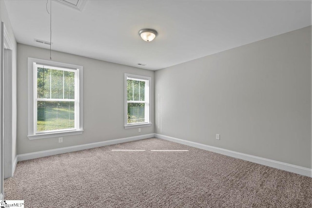 view of carpeted spare room