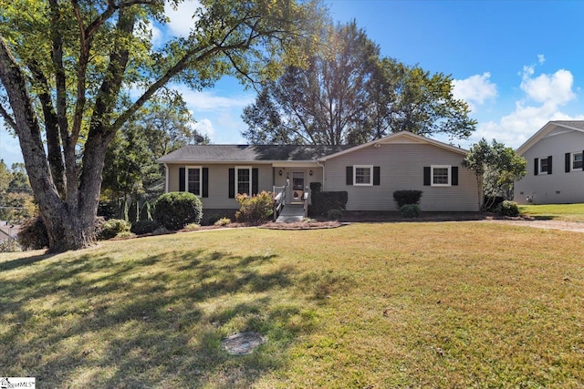 single story home with a front lawn