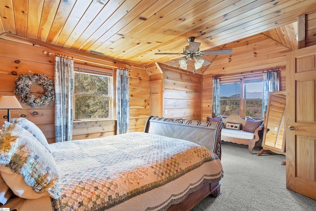 bedroom featuring wood ceiling, wood walls, and vaulted ceiling