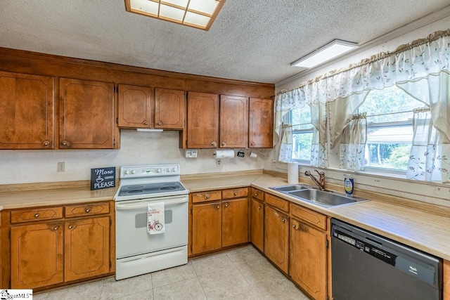 kitchen featuring dishwasher, sink, electric range, and a textured ceiling