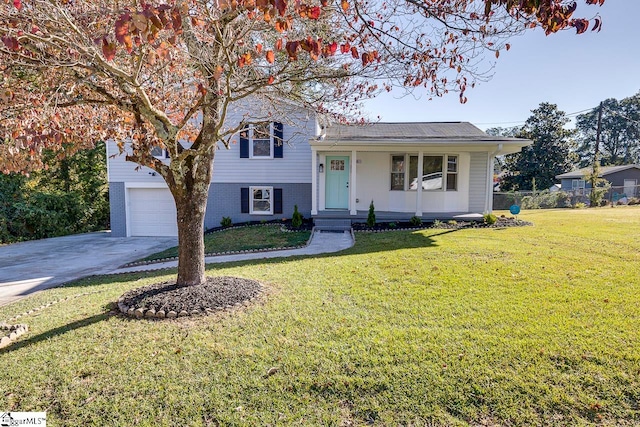 split level home with a front lawn