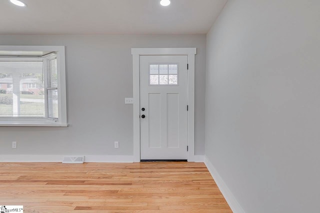 entrance foyer with light wood-type flooring