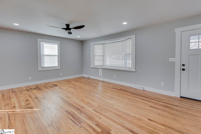 foyer entrance featuring light hardwood / wood-style floors and ceiling fan