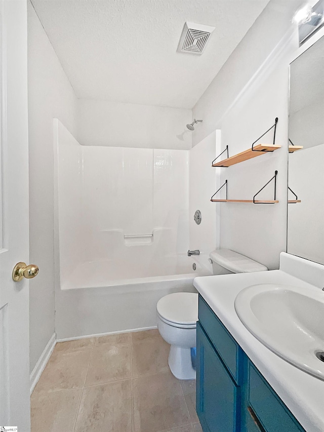 full bathroom featuring a textured ceiling, toilet, tile patterned floors, vanity, and tub / shower combination