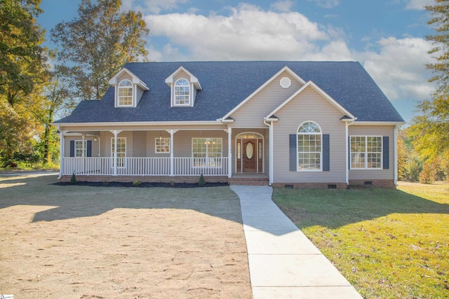 view of front facade with covered porch and a front lawn