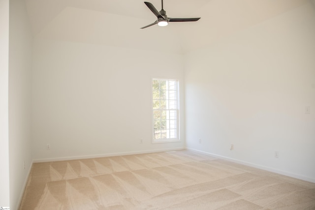 spare room with light carpet and ceiling fan