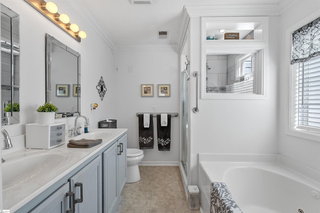 full bathroom with vanity, ornamental molding, shower with separate bathtub, and toilet