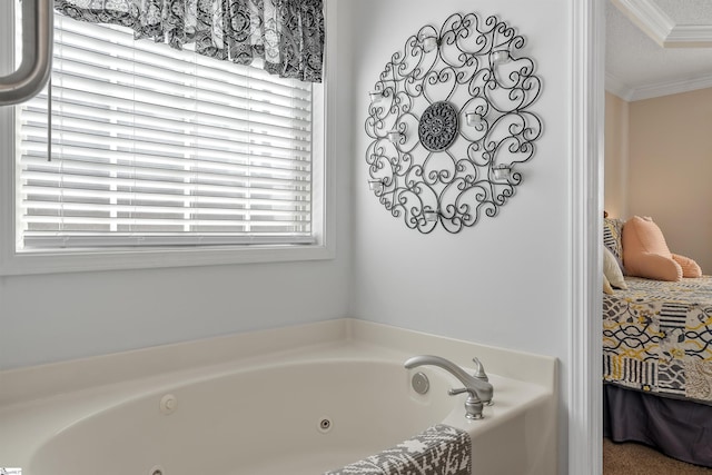 bathroom featuring a bathing tub, crown molding, a textured ceiling, and a healthy amount of sunlight