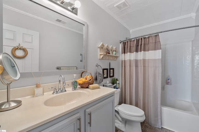 full bathroom featuring vanity, crown molding, shower / bath combination with curtain, and toilet