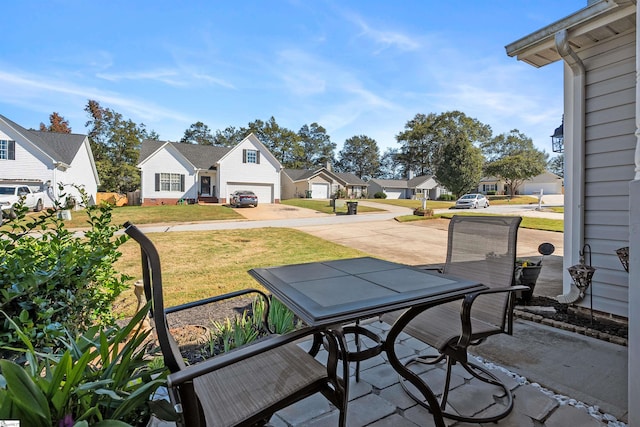 view of patio featuring a garage