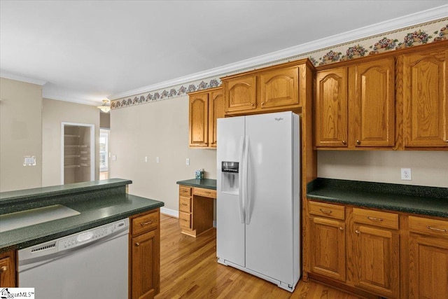 kitchen with white appliances, ornamental molding, and light wood-type flooring