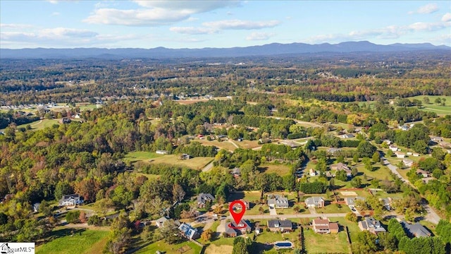 drone / aerial view featuring a mountain view