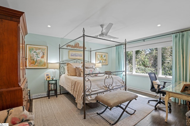 bedroom featuring hardwood / wood-style floors and ceiling fan