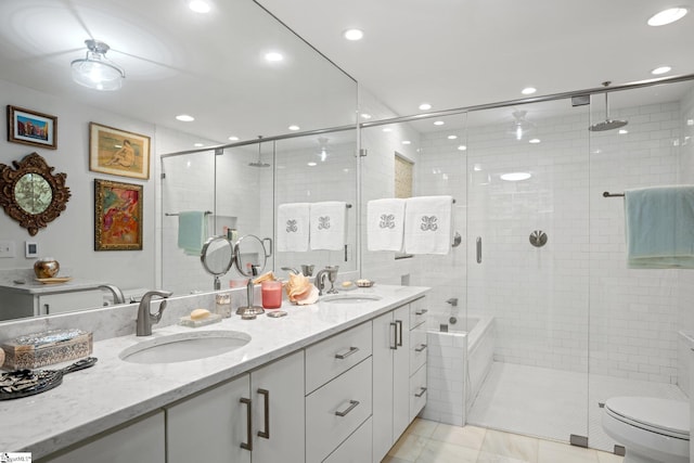 full bathroom featuring vanity, toilet, separate shower and tub, and tile patterned flooring