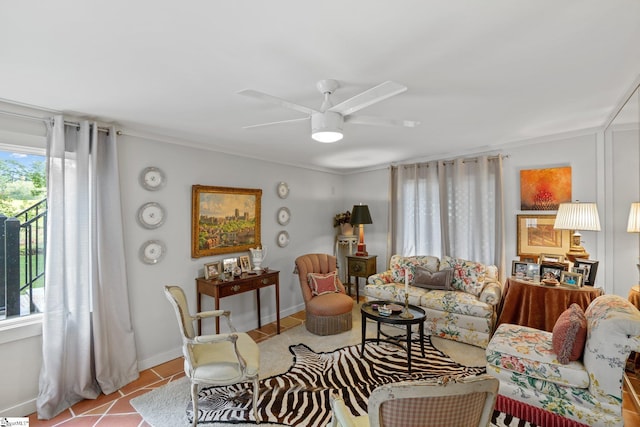 living room with light tile patterned floors and ceiling fan