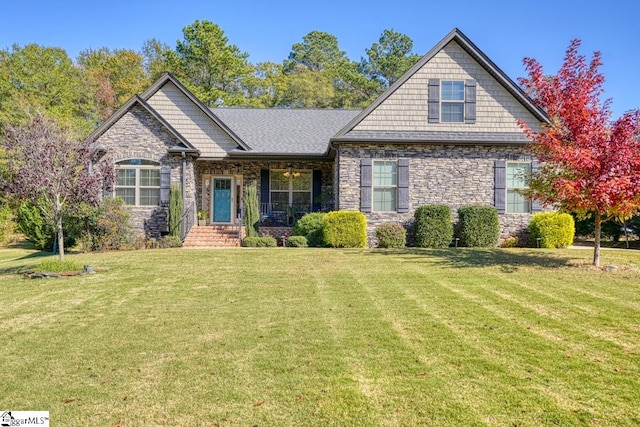 view of front of home with a front lawn