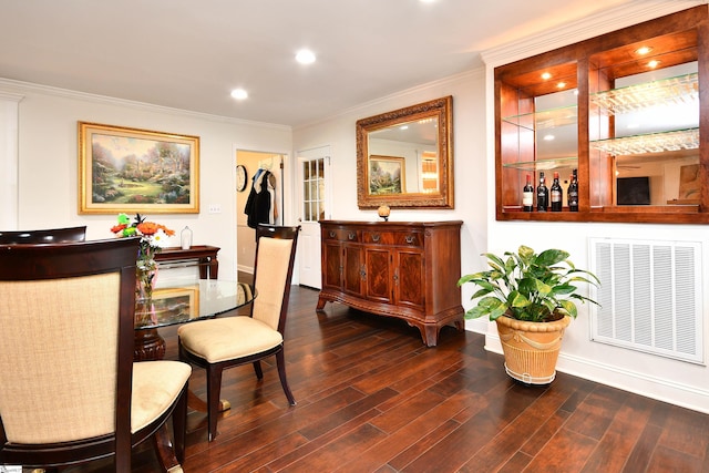 interior space featuring crown molding, dark hardwood / wood-style floors, and radiator