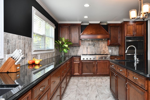 kitchen featuring decorative backsplash, premium range hood, dark stone countertops, crown molding, and stainless steel appliances