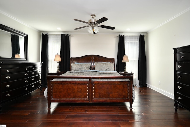 bedroom featuring dark hardwood / wood-style flooring, crown molding, and ceiling fan