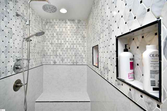 interior space featuring tile walls and tiled shower