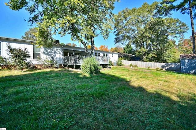 view of yard with a deck