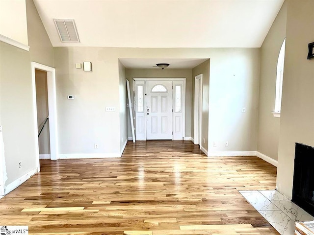 foyer entrance featuring light hardwood / wood-style flooring