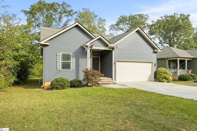 view of front facade with a front yard and a garage